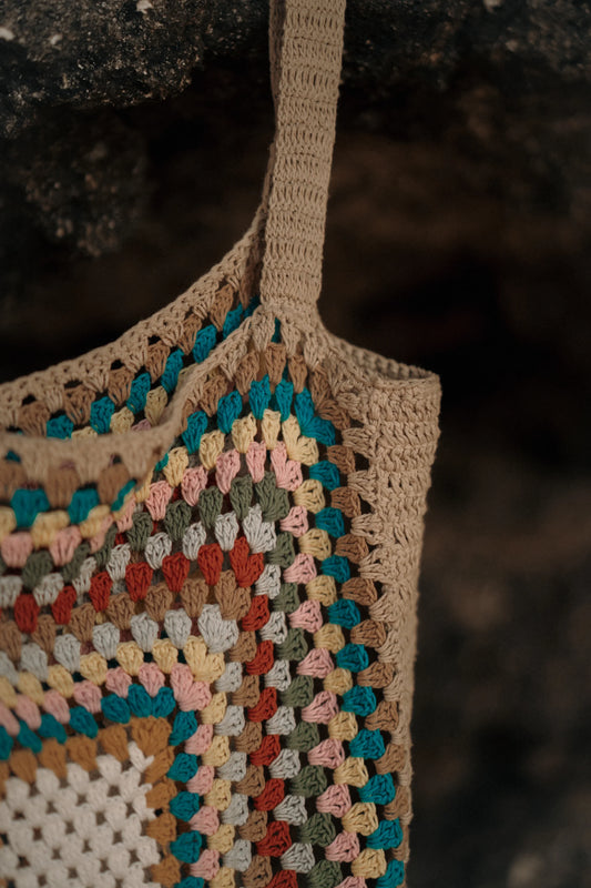 Orion Shopper Bag in Natural brown - a large open-weave crochet shopper with multicolour granny square center panel, close view | NYALA