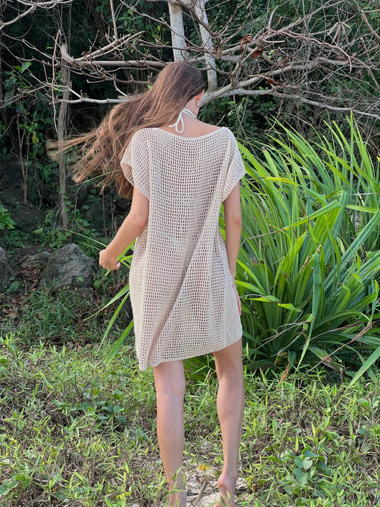 Butterfly Tunic in Nude - open-weave crochet tunic with butterfly motif, round neckline, and cap sleeves, back view | NYALA