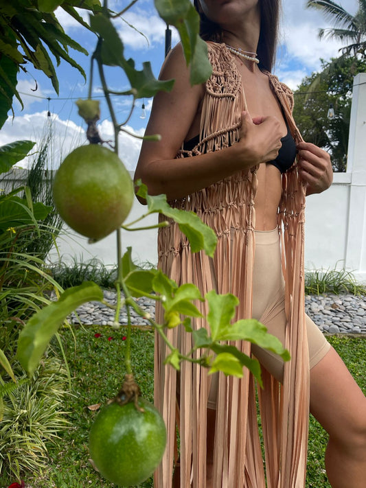 Hawa Vest in Nude - sleeveless macramé open-front vest with intricate knotwork and dramatic floor-length fringe, close view | NYALA