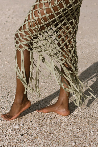 Ahana Dress in Olive – handcrafted macramé maxi dress with tassel hem, detail side view | NYALA
