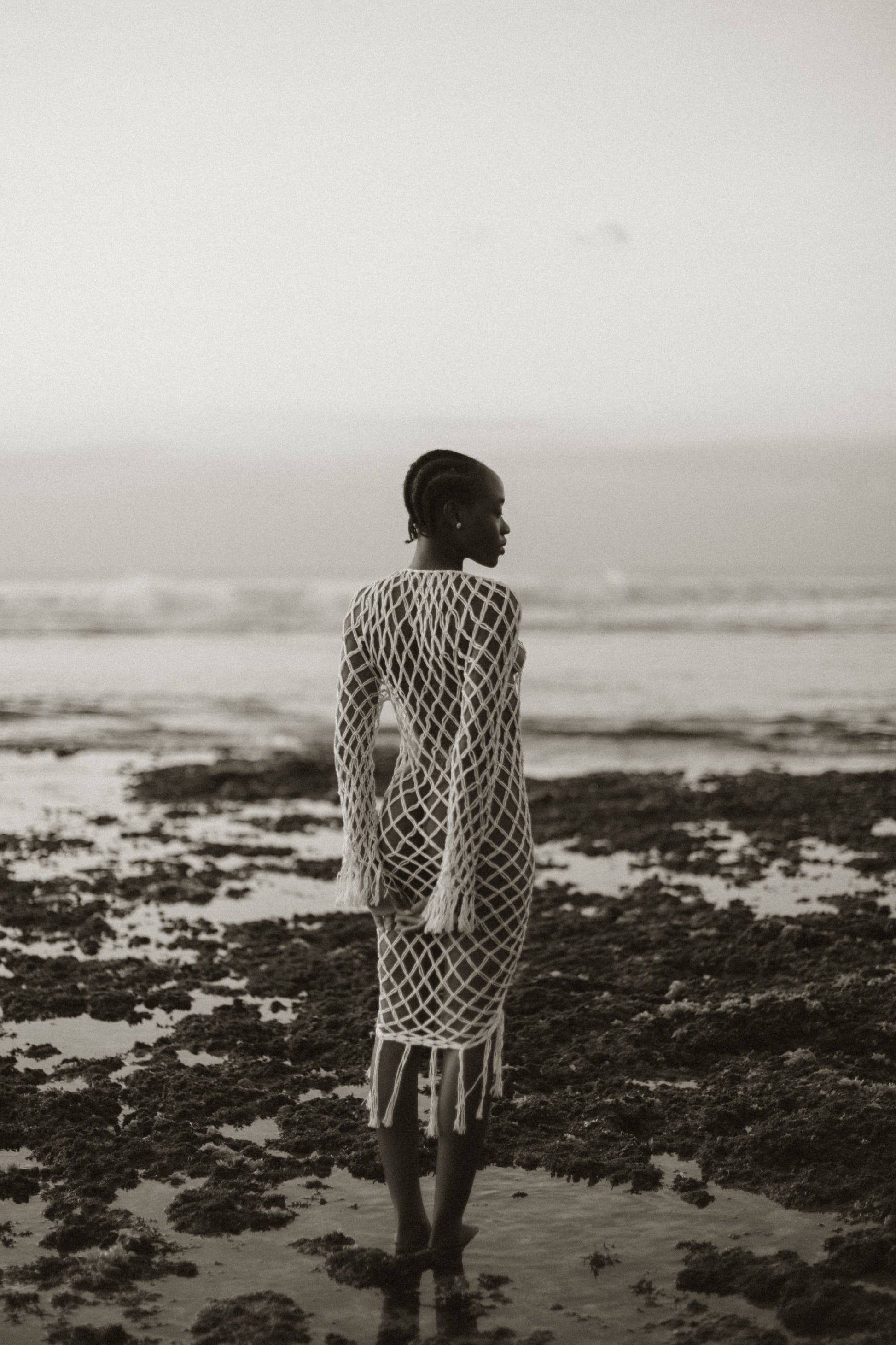 Aoloa Cardigan in Ivory — handcrafted diamond net macramé maxi cardigan with fringe hem, back view | NYALA