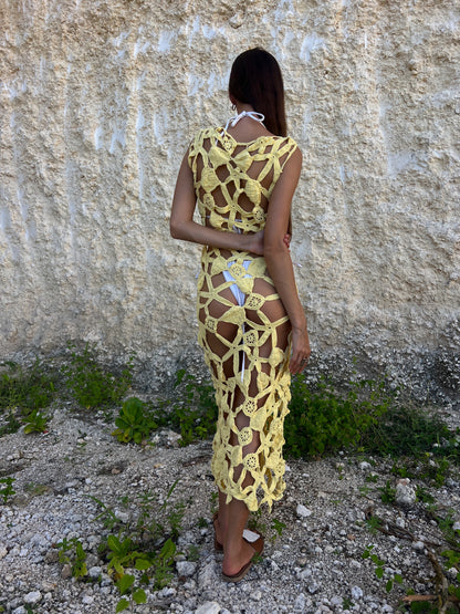 Plumeria Dress in Canary Yellow - bold floral crochet midi cover-up with open back and scalloped hem, back view | NYALA