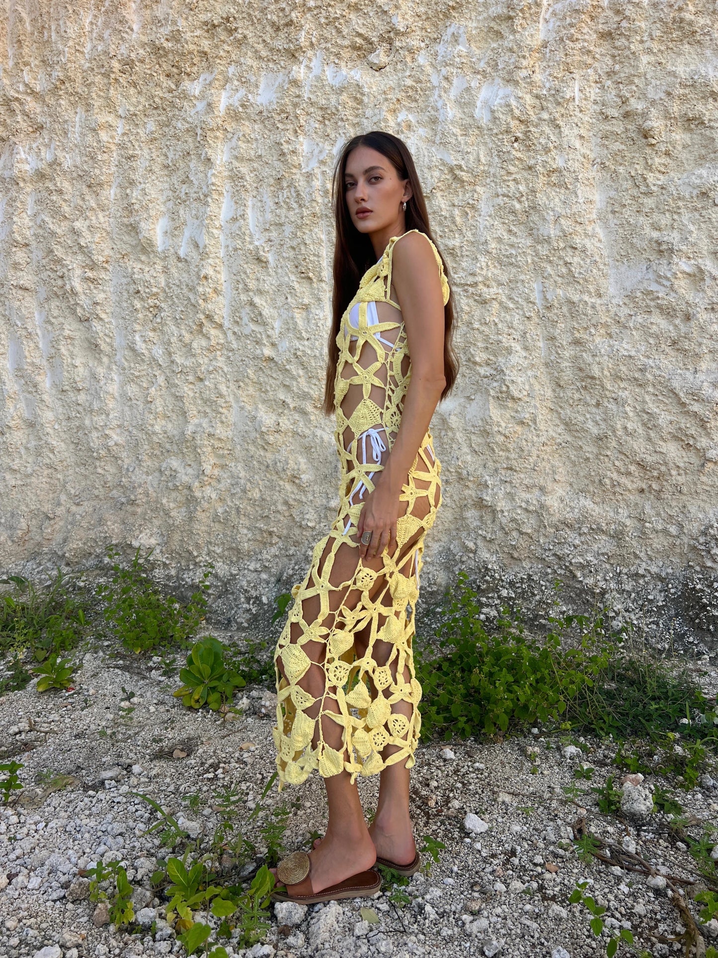 Plumeria Dress in Canary Yellow - bold floral crochet midi cover-up with open back and scalloped hem, side view | NYALA