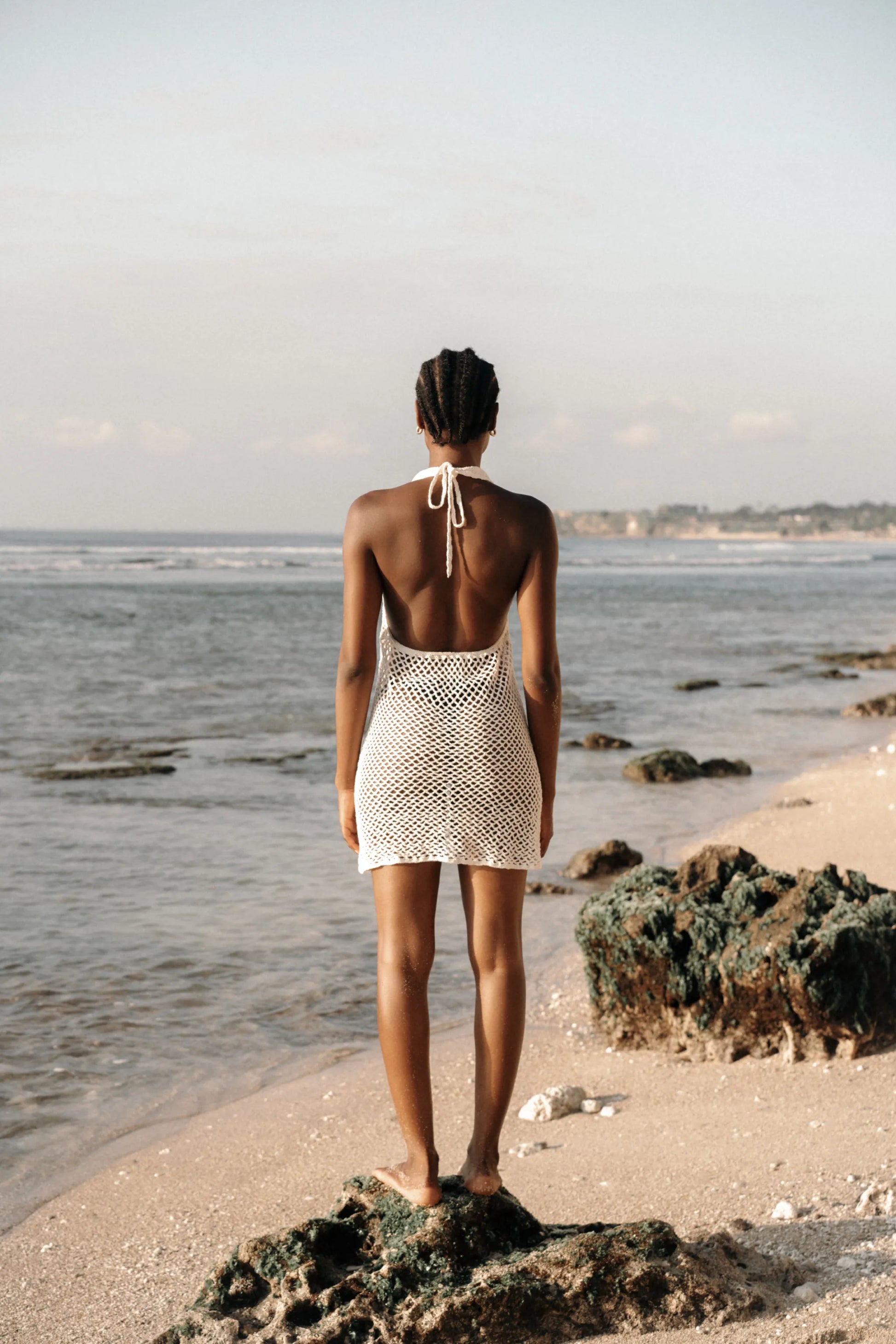 Pallavi Dress in Ivory - crochet knee dress with open back, back view | NYALA