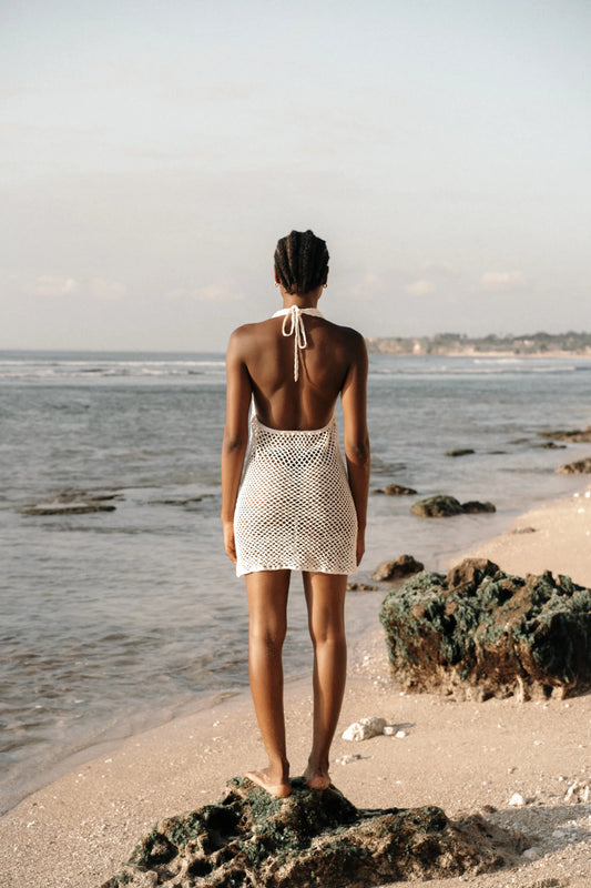 Pallavi Dress in Ivory - crochet knee dress with open back, back view | NYALA