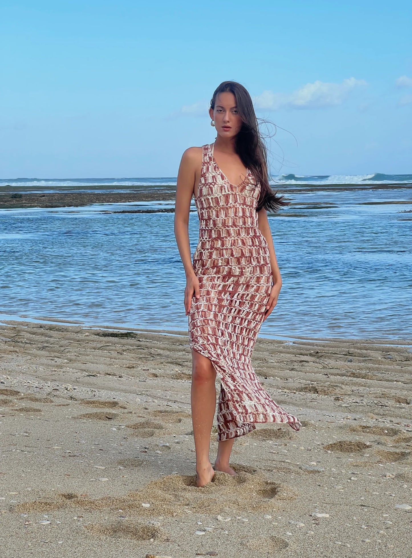 Renata Dress in Mocha - hand-crocheted halter midi dress with V-neckline, open back and side slit, front view | NYALA