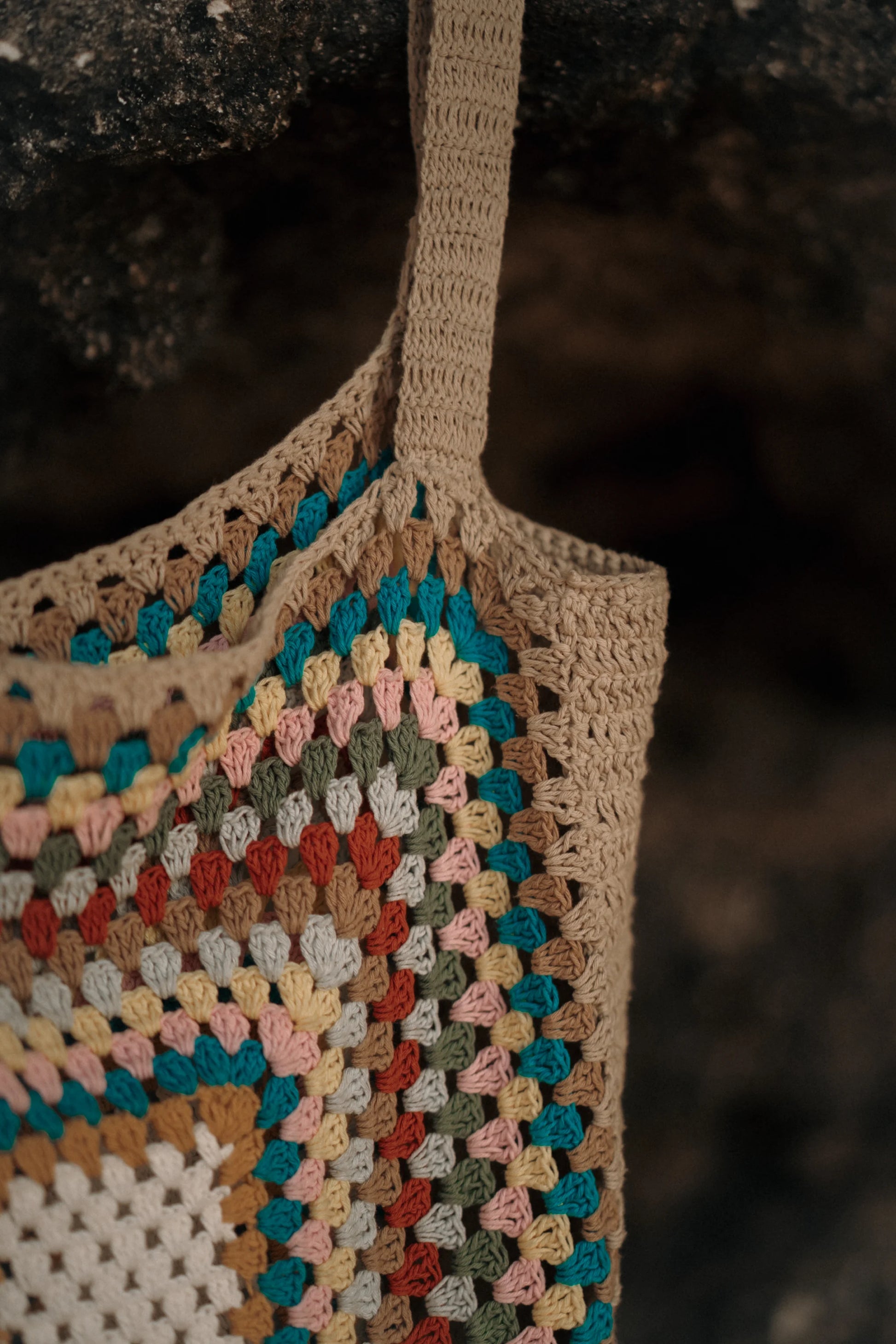 Orion Shopper Bag in Natural brown - a large open-weave crochet shopper with multicolour granny square center panel, close view | NYALA