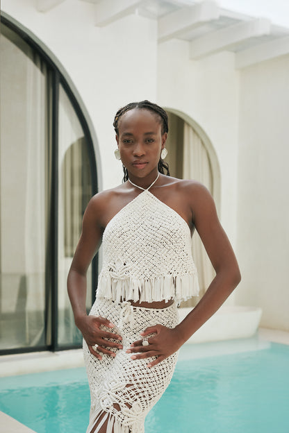 Haima Set in Ivory - macramé halter crop top and fringe mini skirt with long tassel hem, front view | NYALA