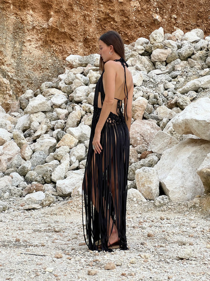 Salena Dress in Black - macrame halter cover-up with knotwork bodice, deep V front, and floor-length fringe, side view | NYALA