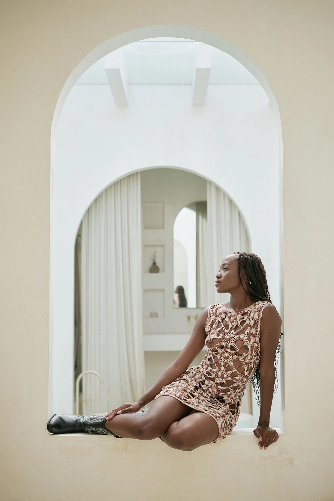 Surya Mini Dress in Mocha - crochet mini beach cover-up, front lifestyle view  | NYALA